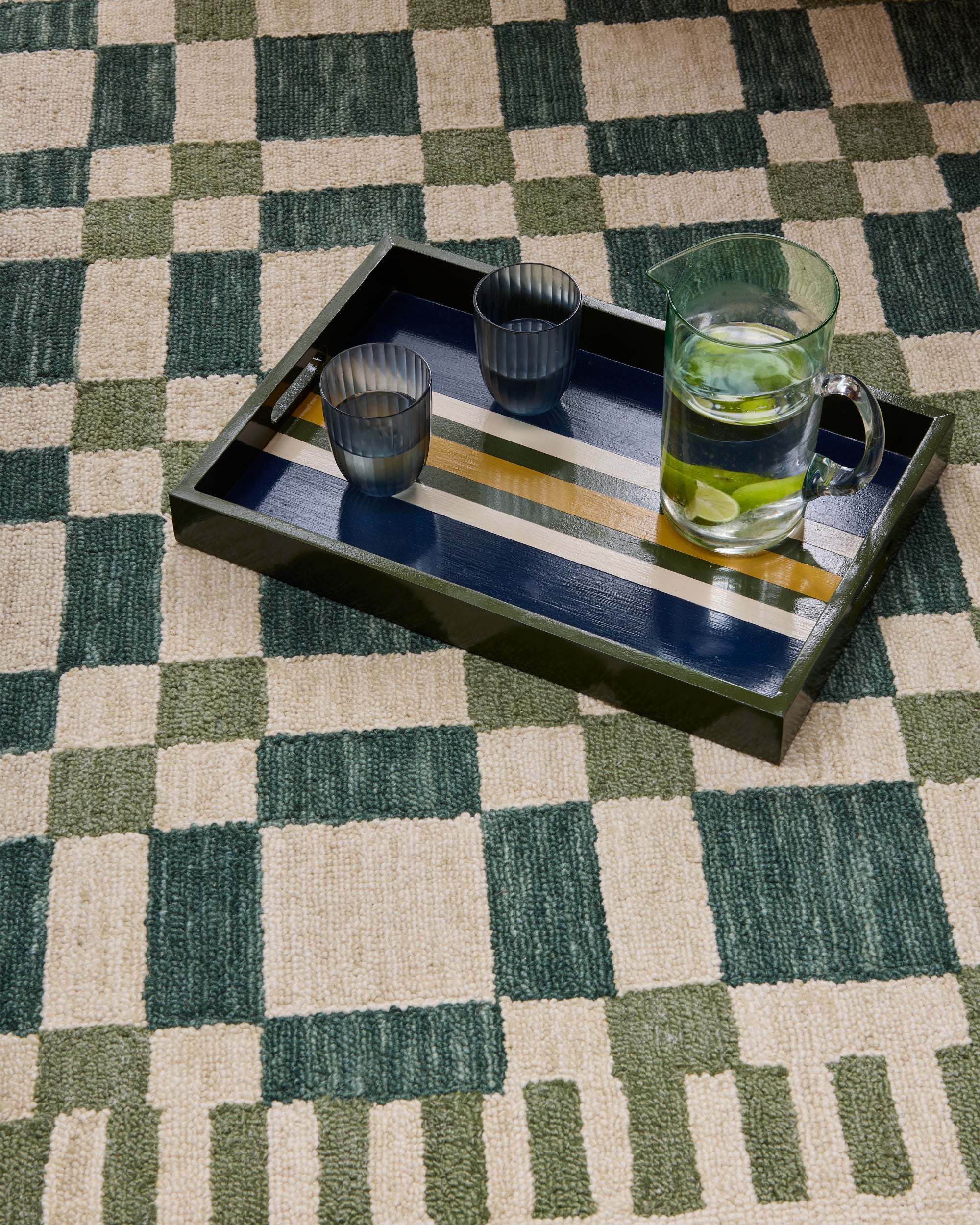 Blue and green stripes tray on the green check mate wool rug