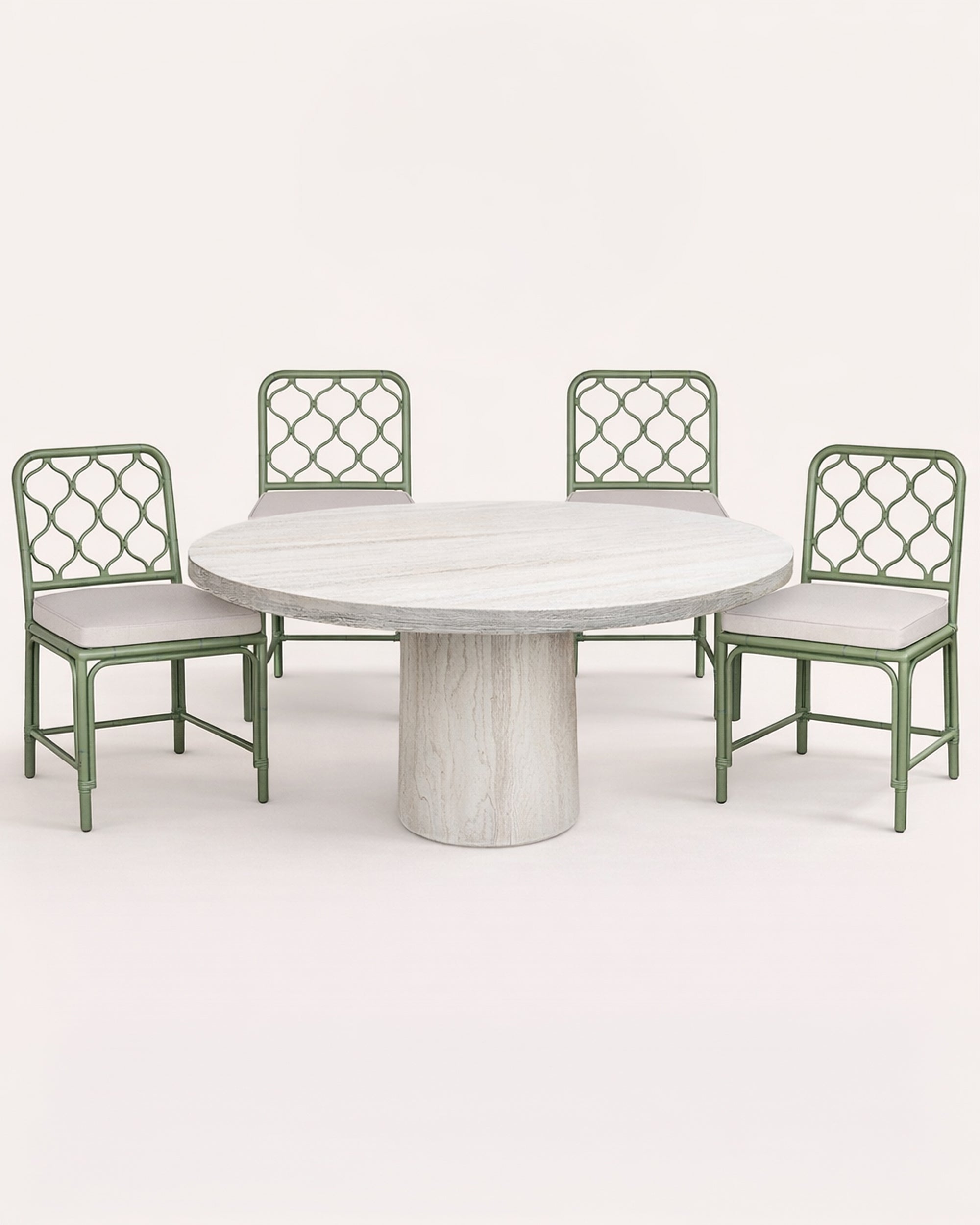 Product bundle showing the white round resin dining table with four Curato green dining chairs