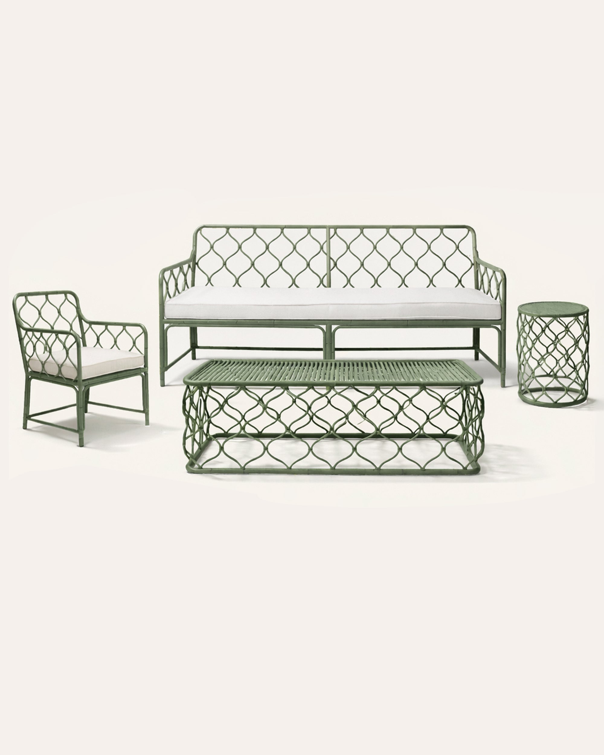 Outdoor furniture set with a sofa, armchair, and coffee table on a white background