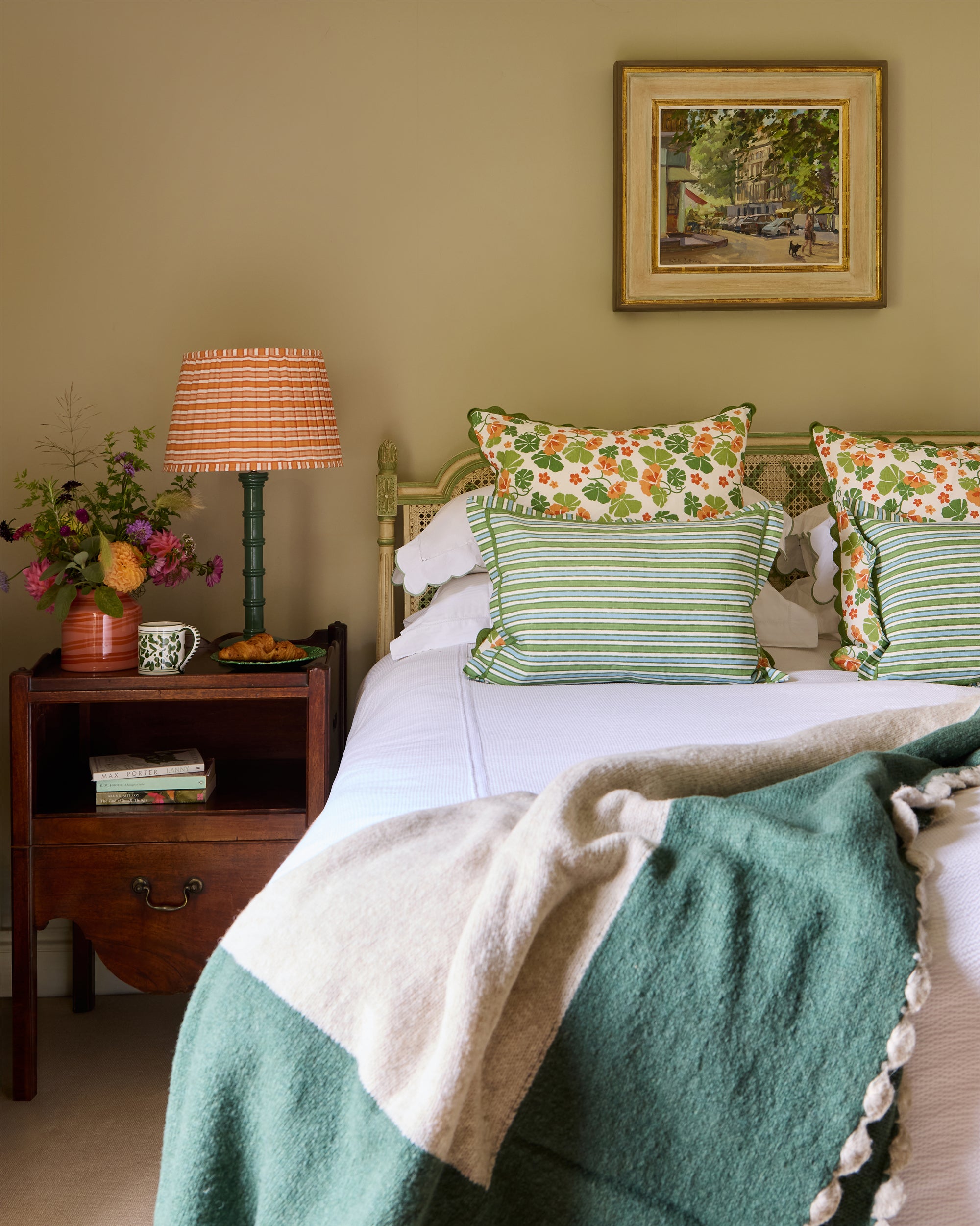 Summery bedroom lifestyle image, showcasing florals and stripes together
- Birdie Fortescue soft furnishings