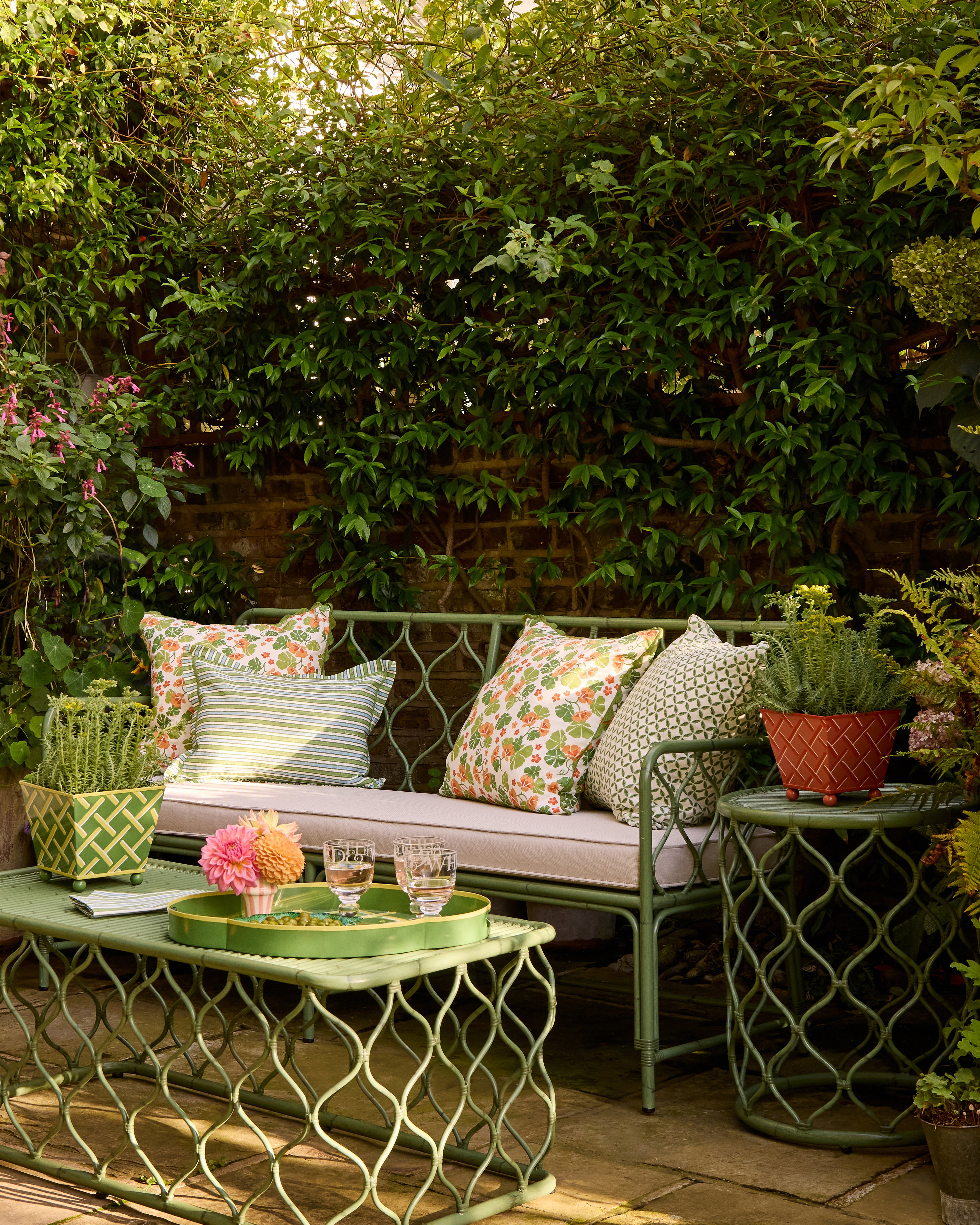 Pretty Summer outdoor seating area, featuring the Curato garden furniture and styled with the Nasturtium collection