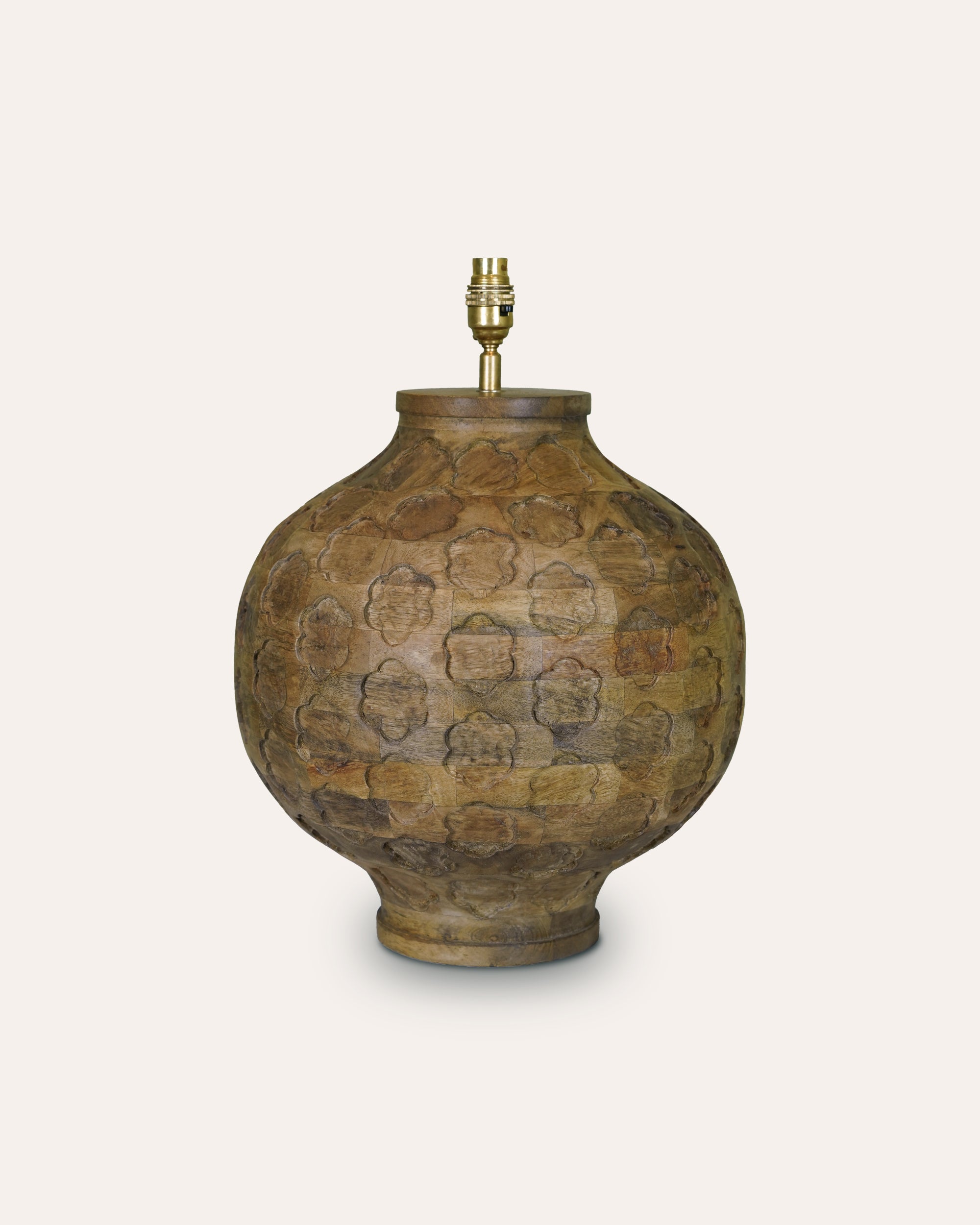 Decorative lamp with textured surface on a white background