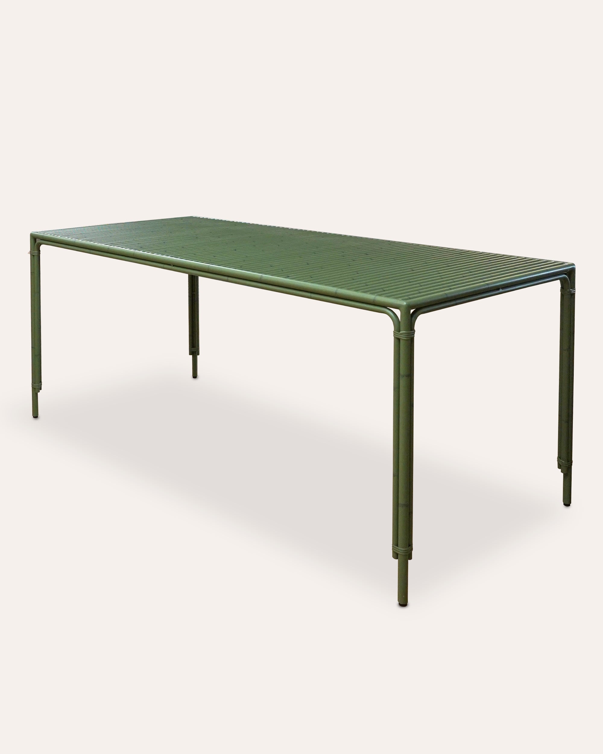 Green aluminium Curato dining table on a white background