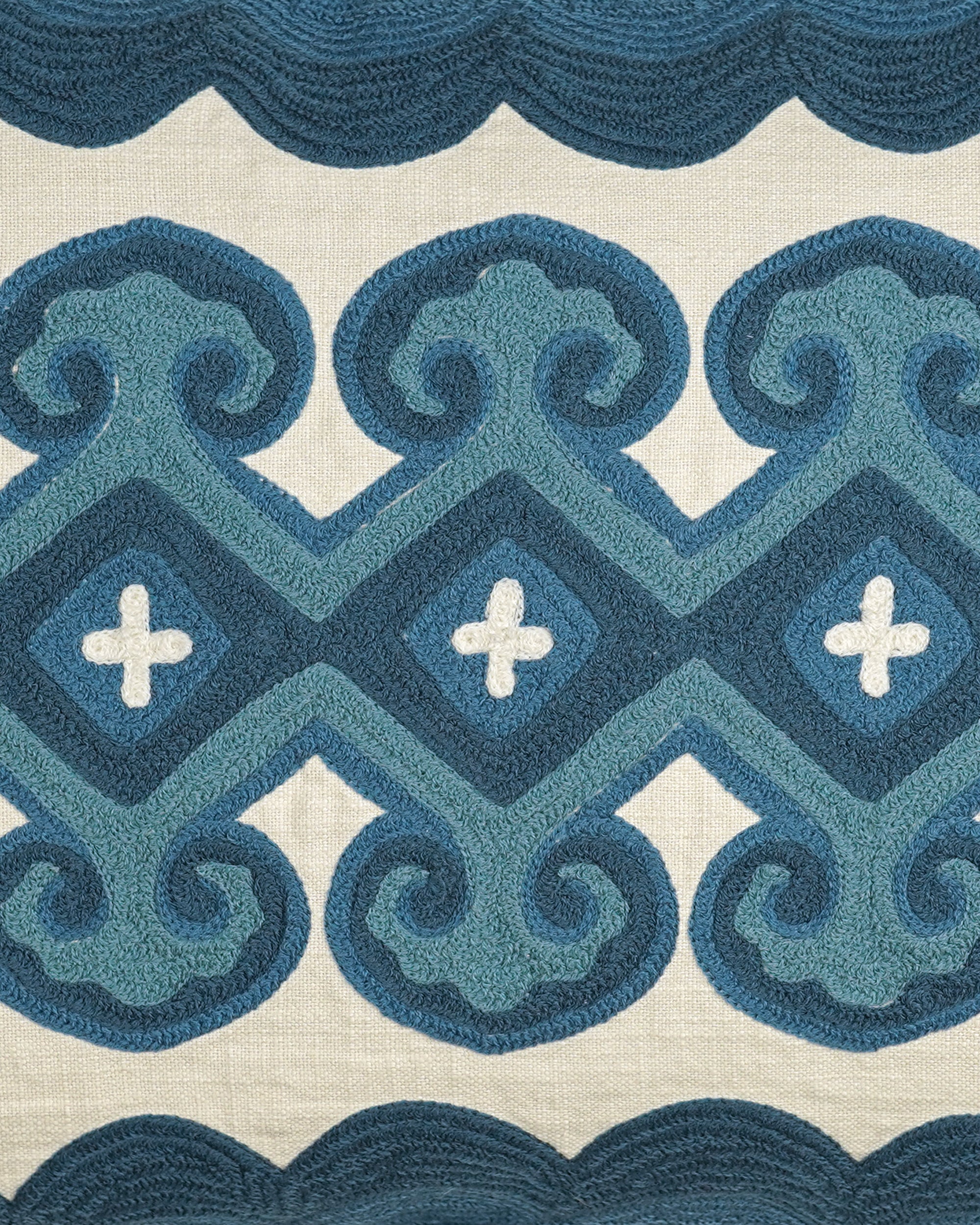 Close up detail of the lattice crewel work cushion