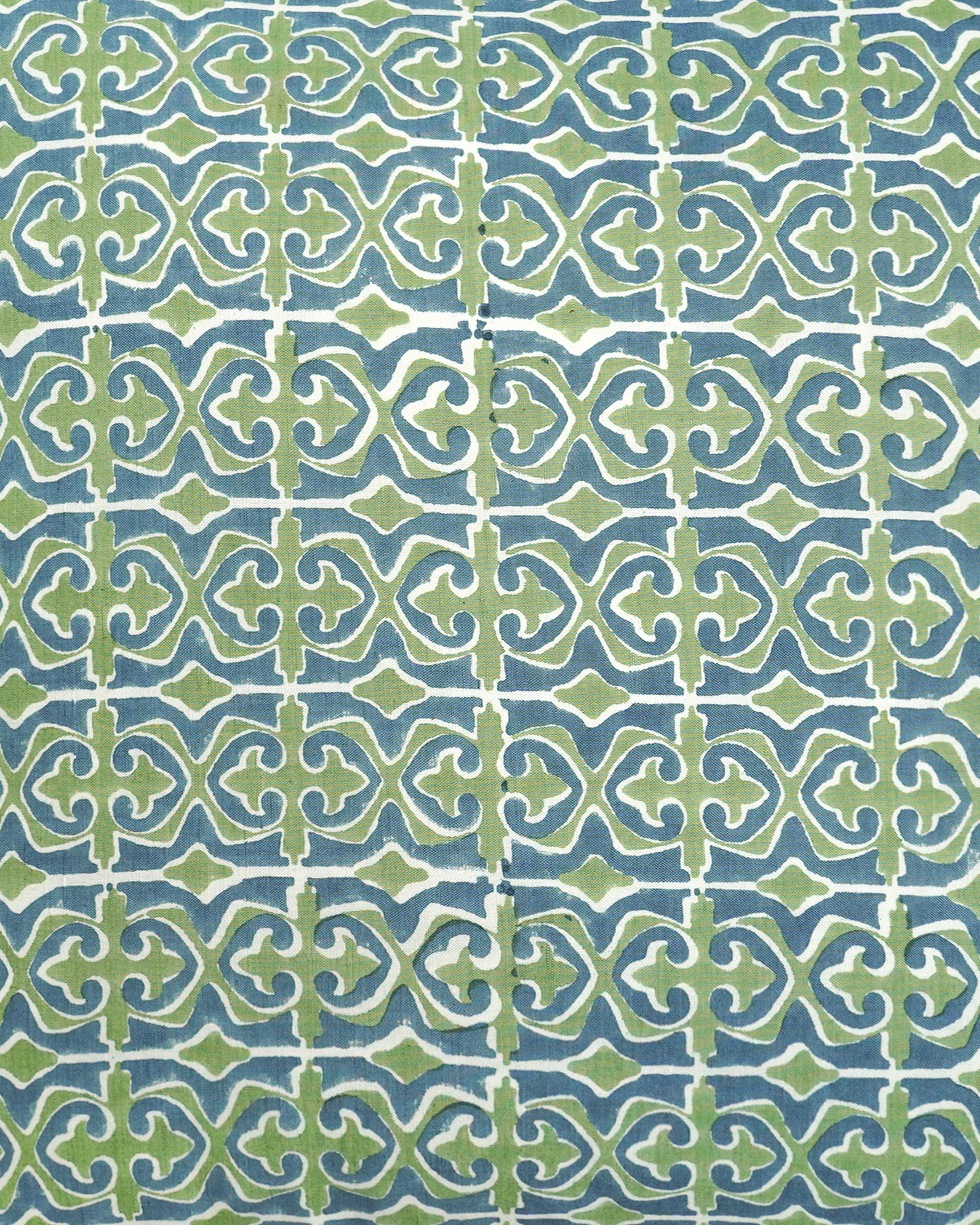 Close up detail image of the blue and green Santa Clara block printed cushion