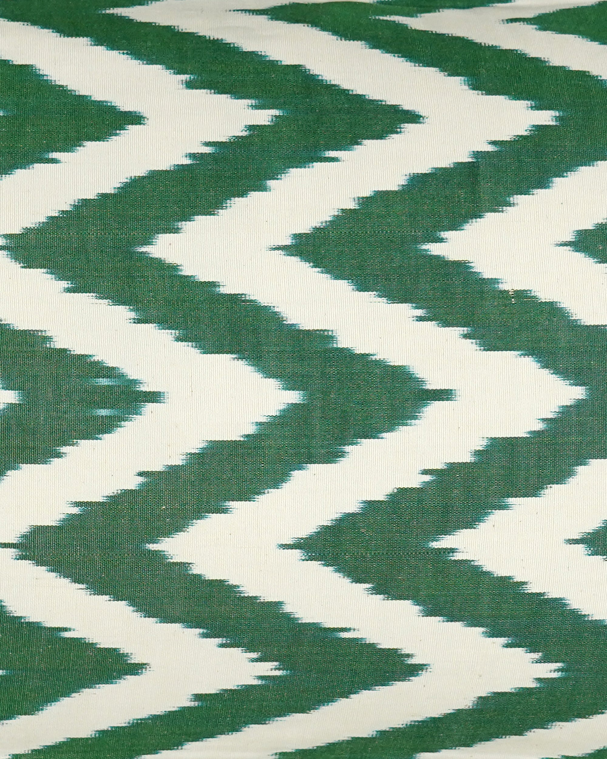 Close-up of green and white zigzag pattern fabric
