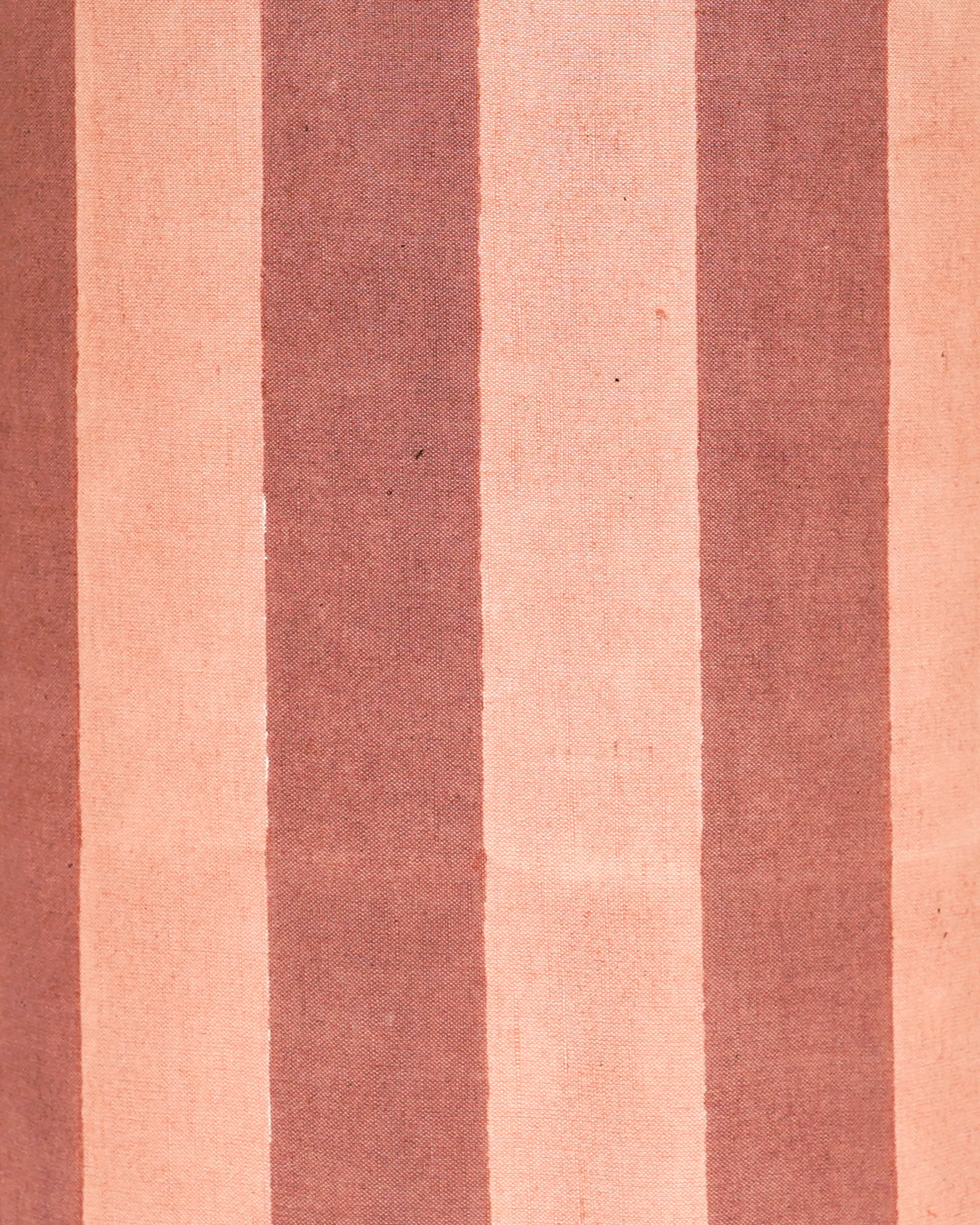 Close up detail image of the pink and red striped drum lampshade