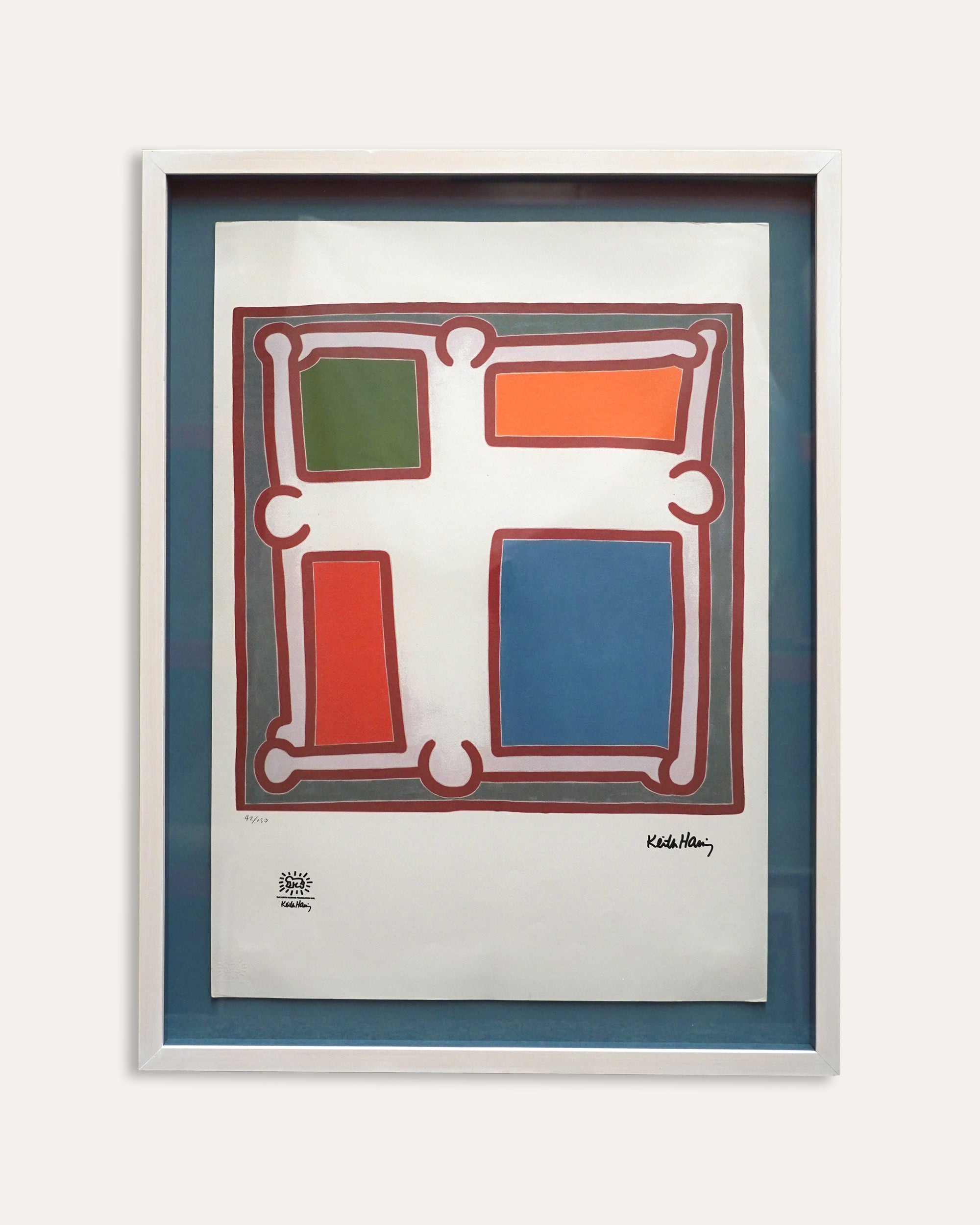 Framed abstract artwork with colorful geometric design on a white background