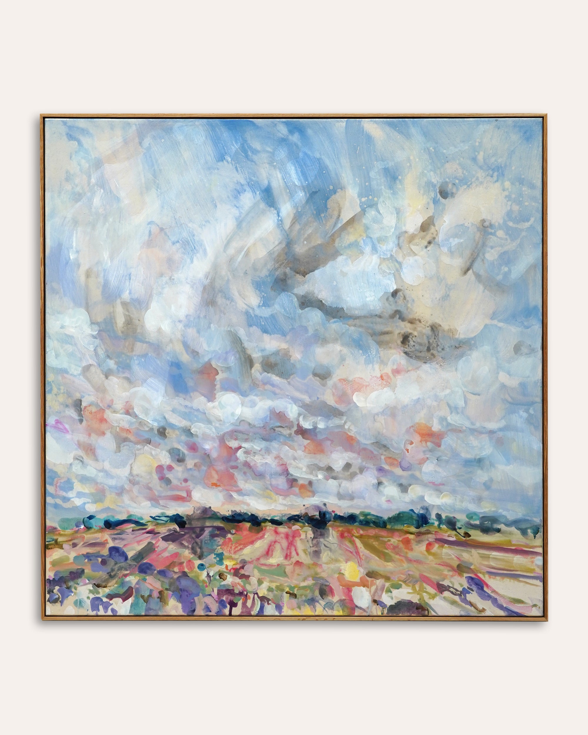 Abstract painting of a landscape with colorful fields and a blue sky.