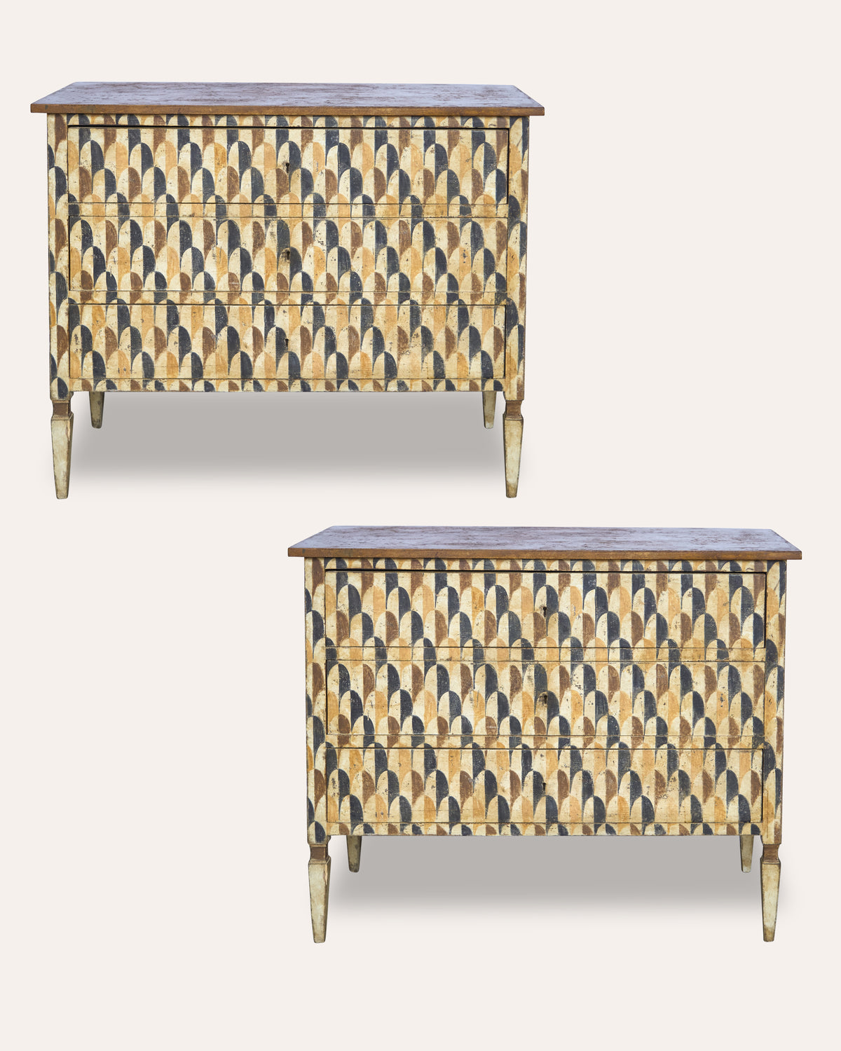 Two matching three-drawer chestnut wood sideboards with a gold and black scalloped bone inlay pattern, shown on a light beige background.