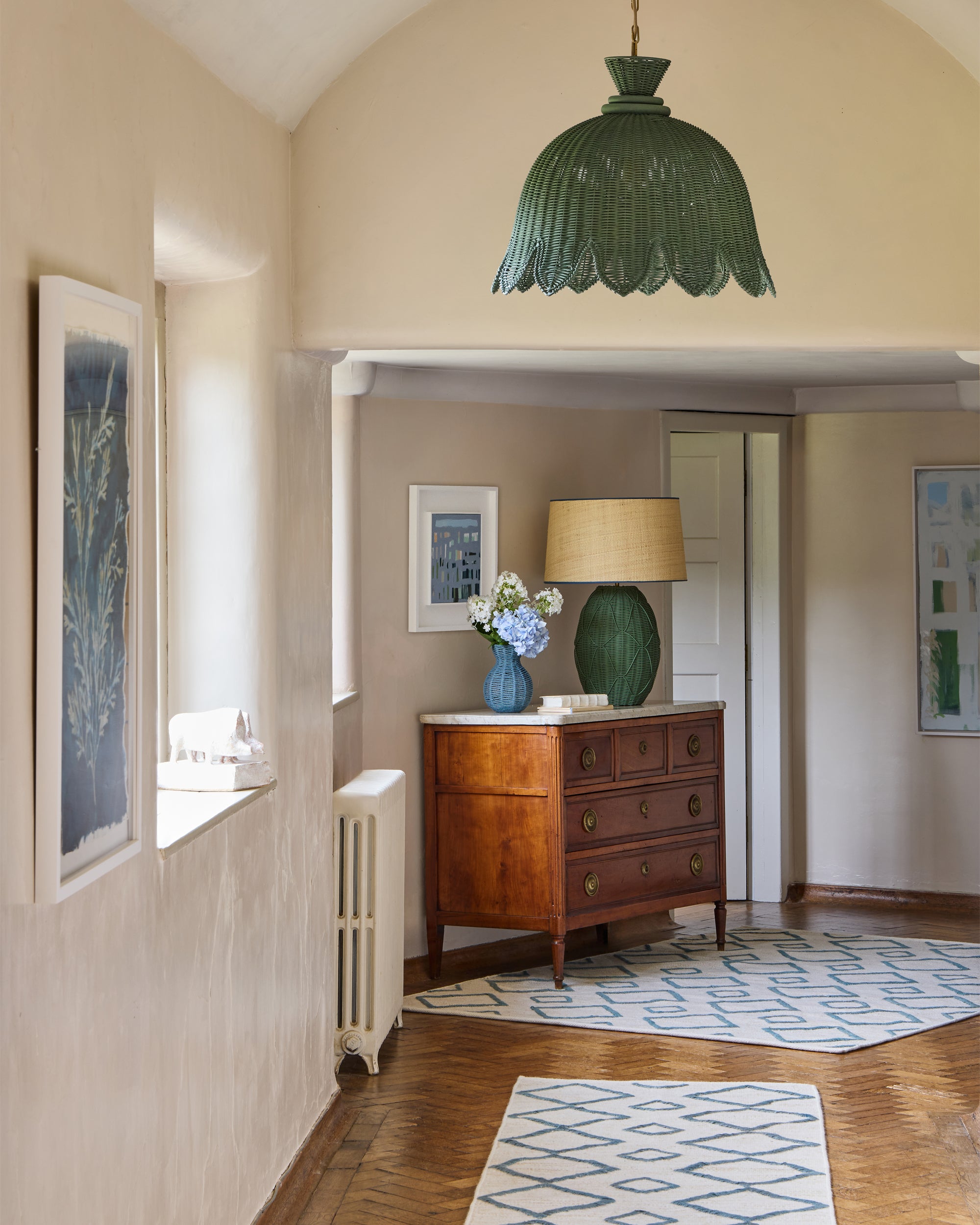 Hallway lifestyle image featuring our green Campnilla pendant light