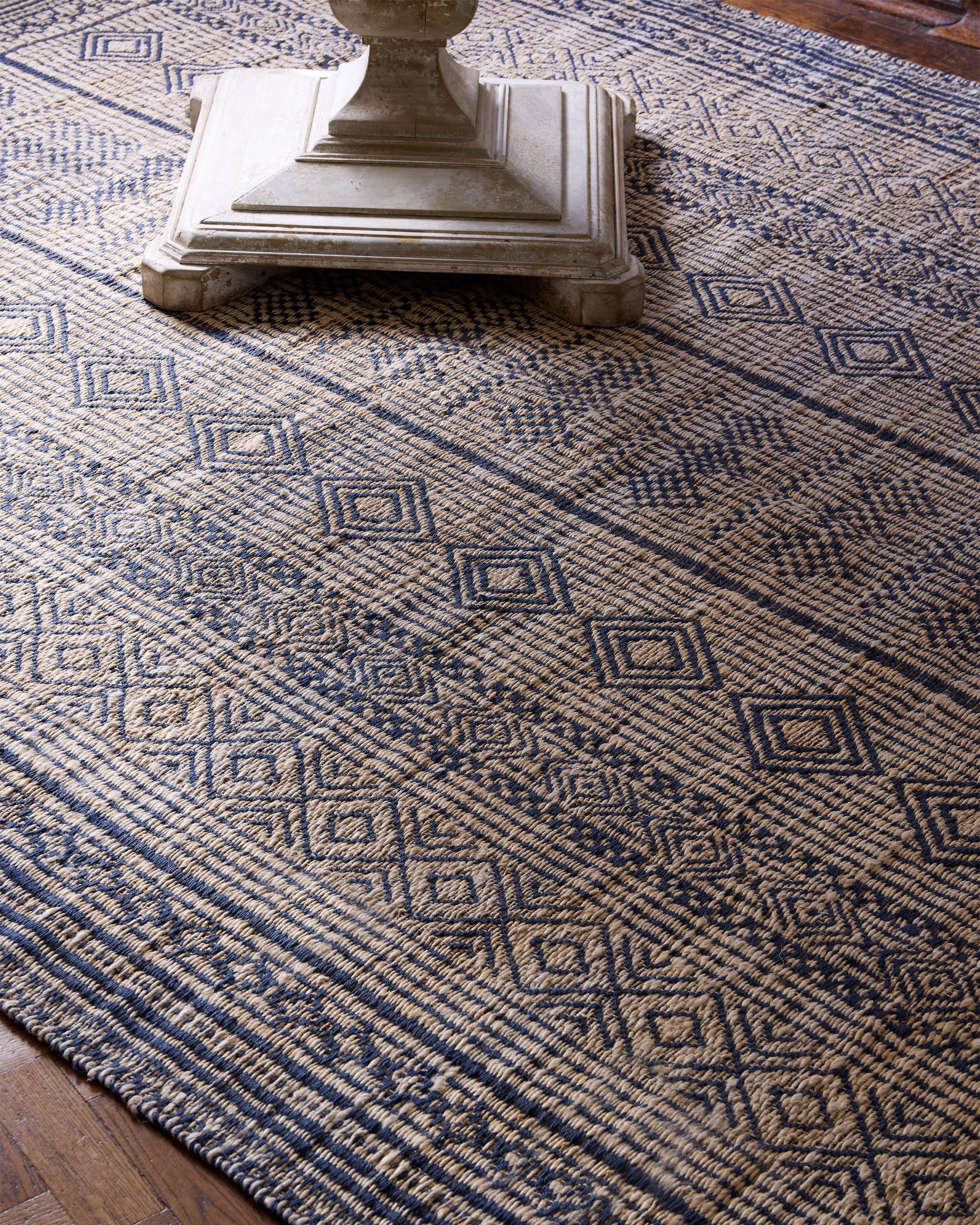 Close up detail lifestyle image of the blue moroccan jute rug