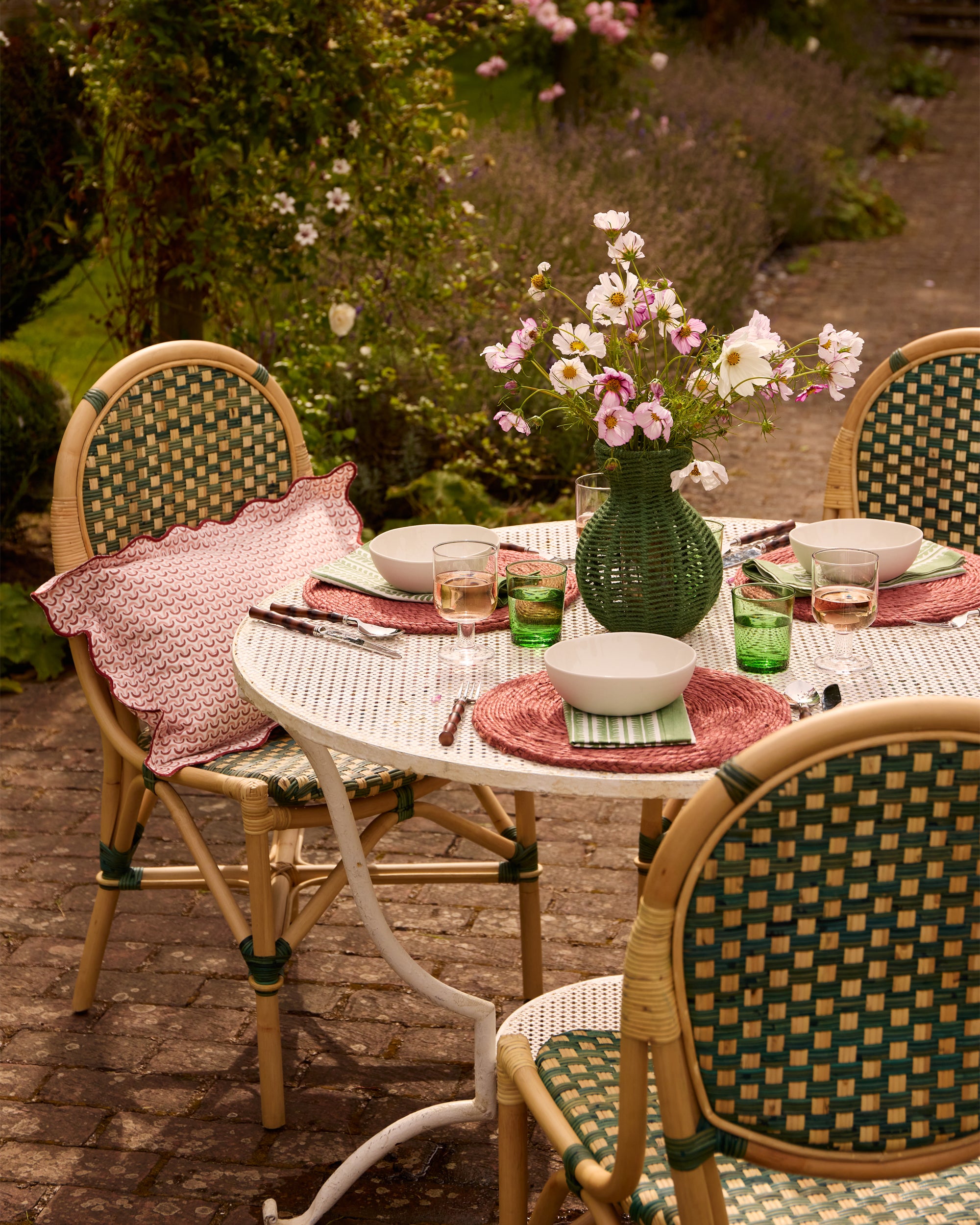 Pretty summer outdoor dining lifestyle image - Birdie Fortescue spring summer 2025