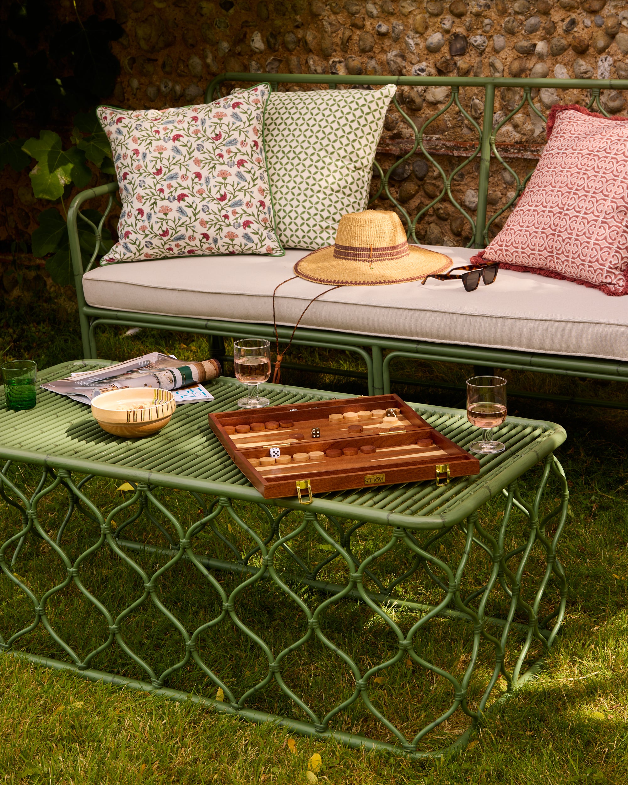 Spring Summer outdoor lifestyle image, relaxed image showcasing the Curato aluminium furniture