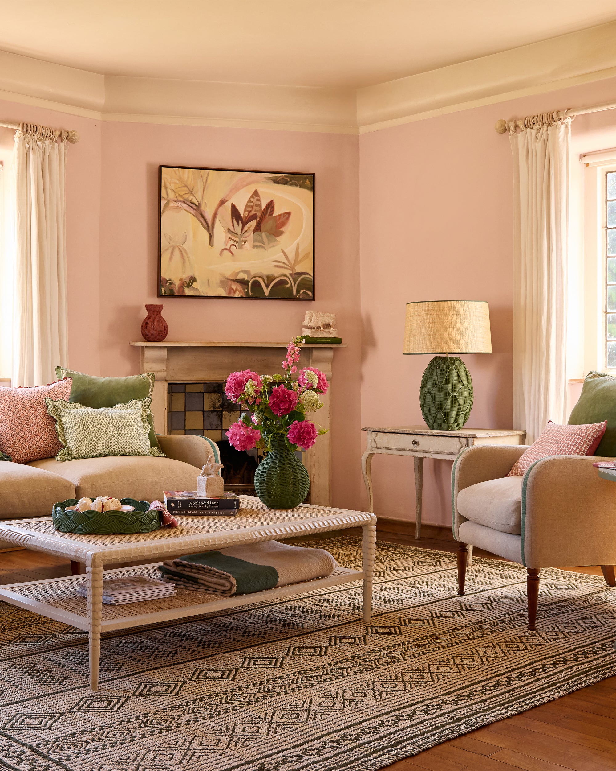 Pink and green themed sitting room featuring the green moroccan jute rug