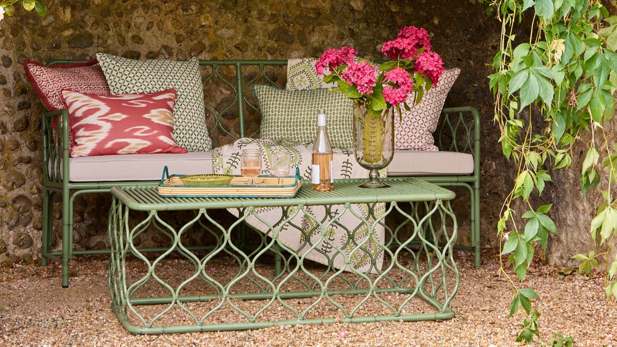 Spring Summer outdoor pink and green lifestyle image - Birdie Fortescue Curato Outdoor Furniture