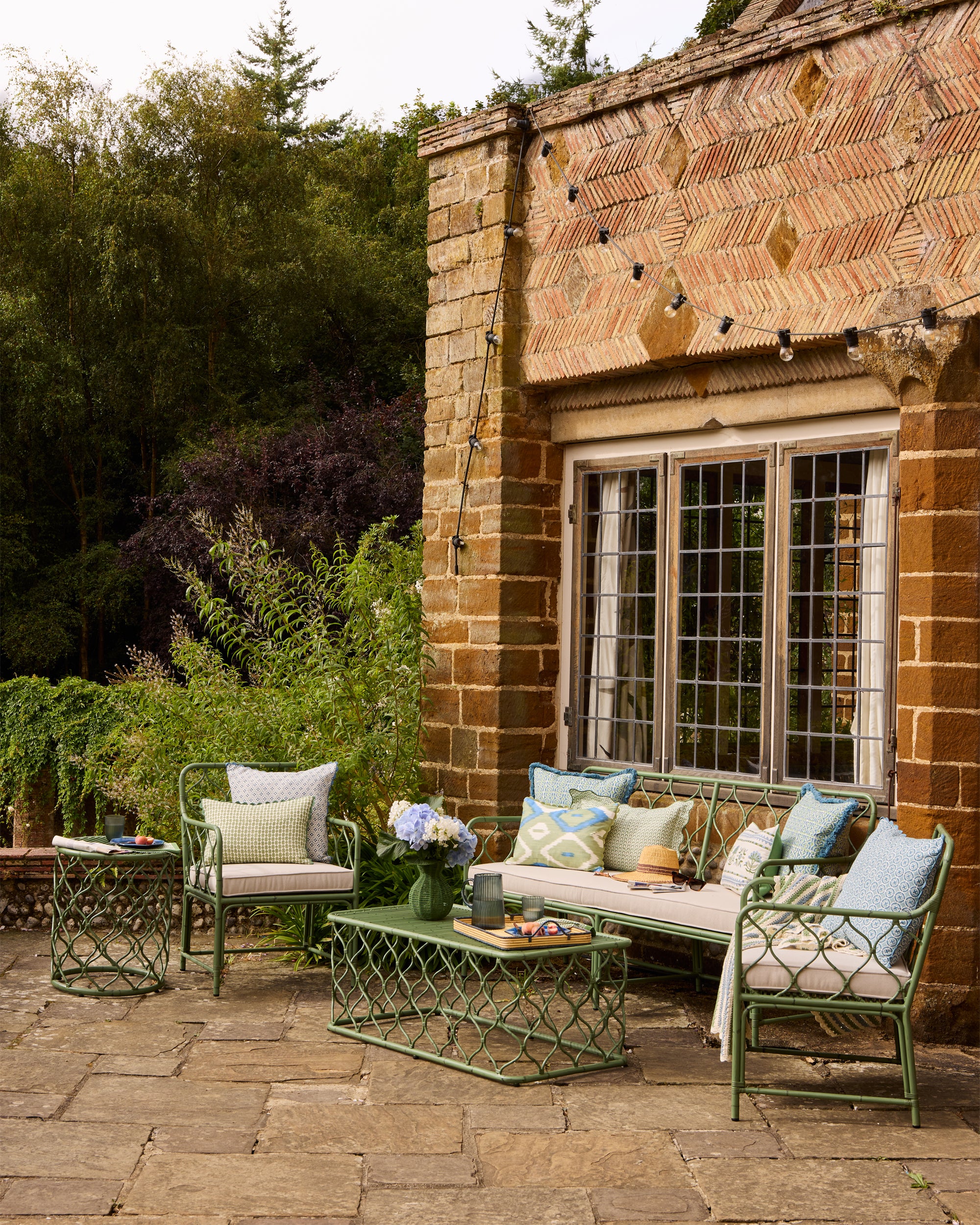 Outdoor summer lifestyle image, showcasing the Curato outdoor garden furniture