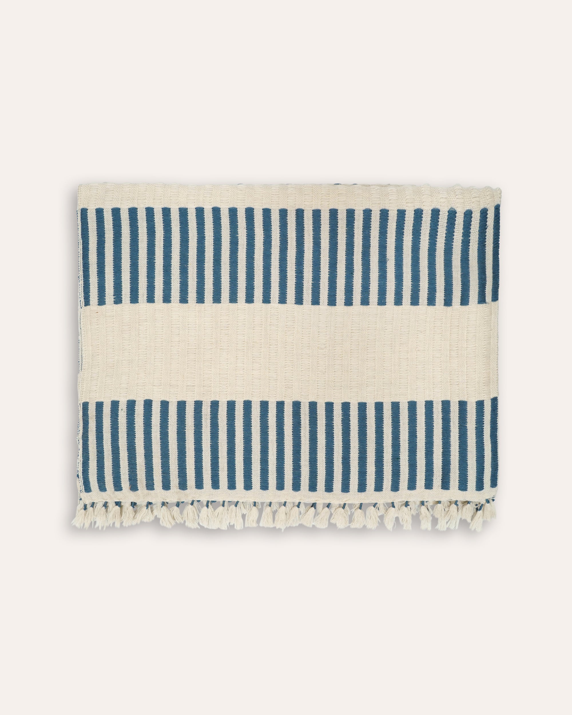 Striped rectangular throw with blue and taupe stripes and tassle borders