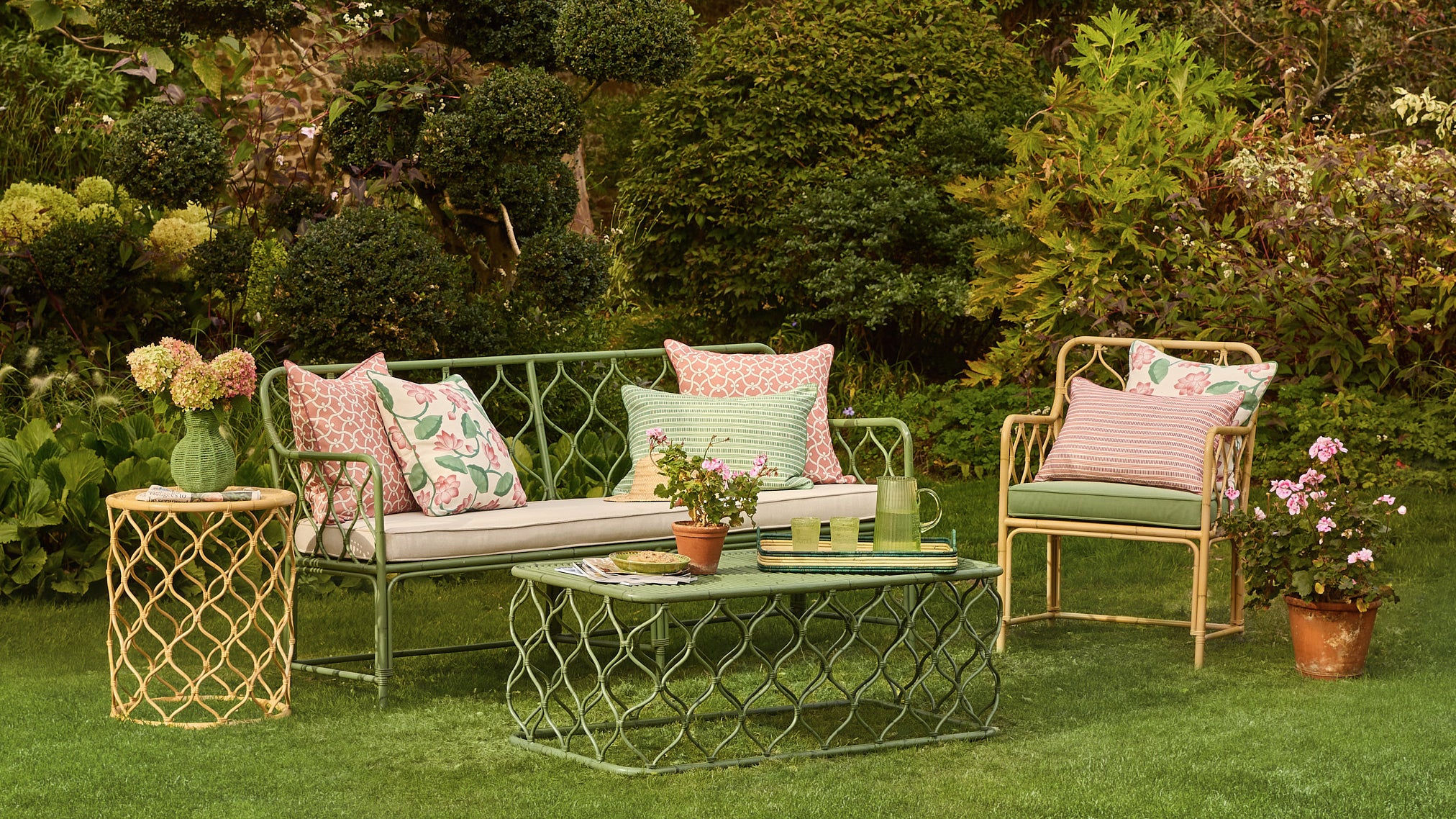 Garden setting with outdoor furniture and decorative elements