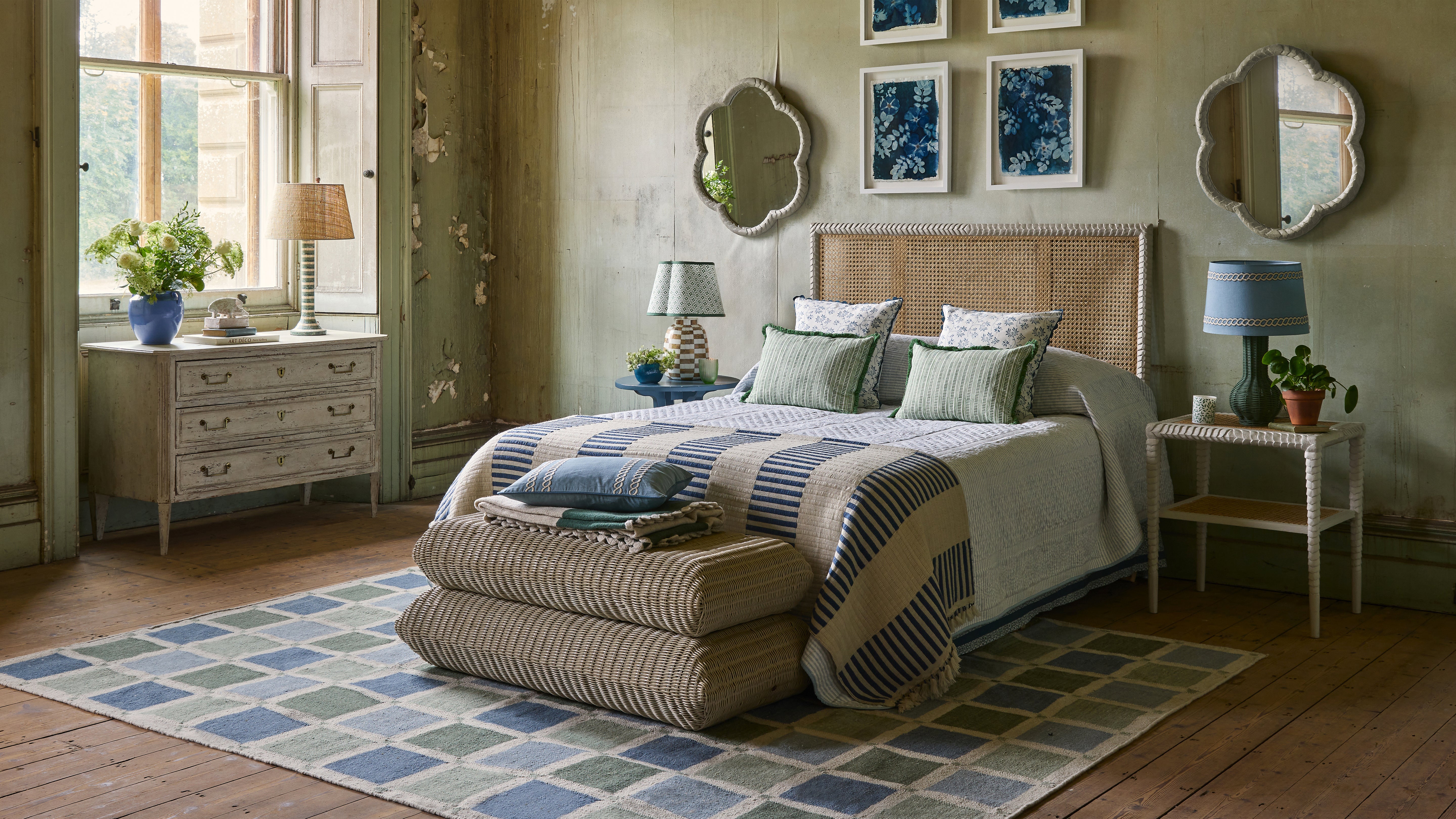 Cozy bedroom with a bed, nightstands, and decorative elements.