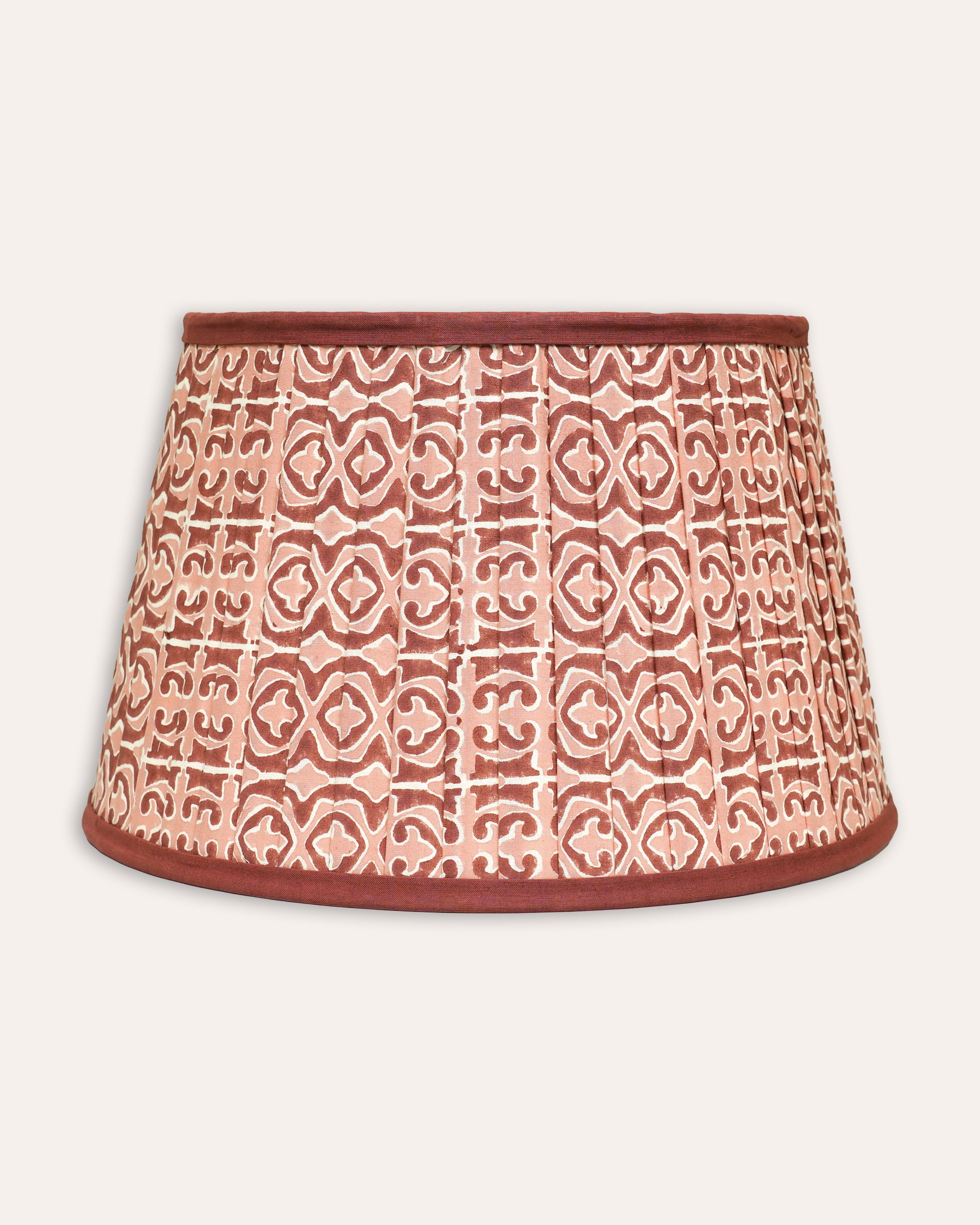 Pink and red Clara pleated block print lampshade with a geometric pattern - Birdie Fortescue lighting