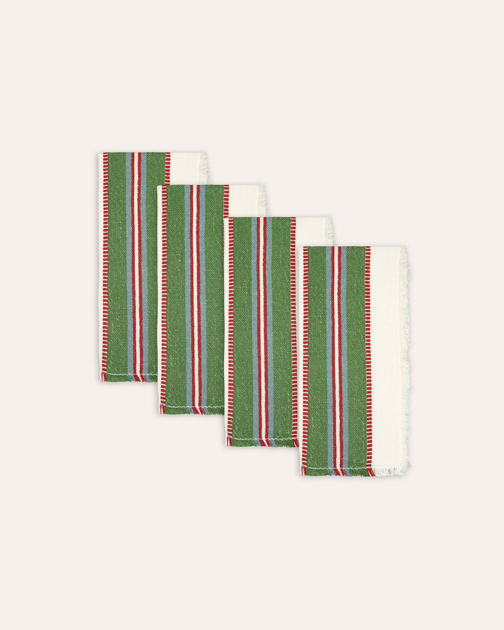 Set of four striped napkins 
with green, red, and white pattern on a white background