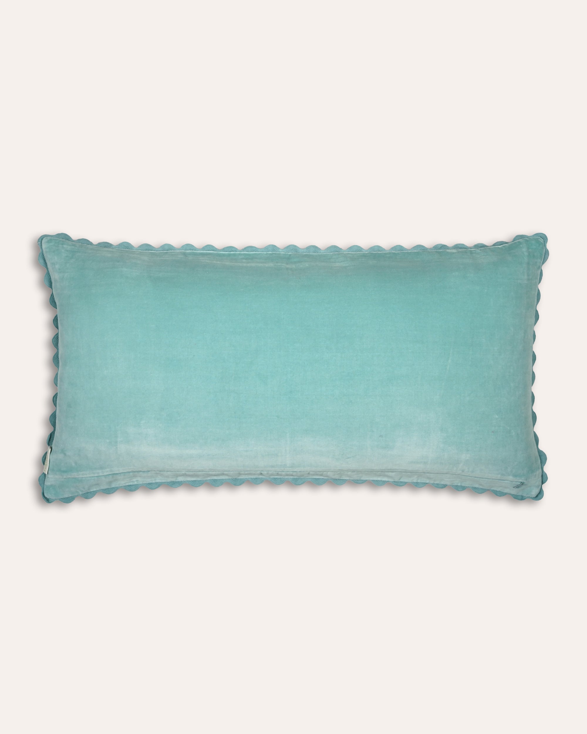 Rectangular blue velvet cushion back with a scalloped edge