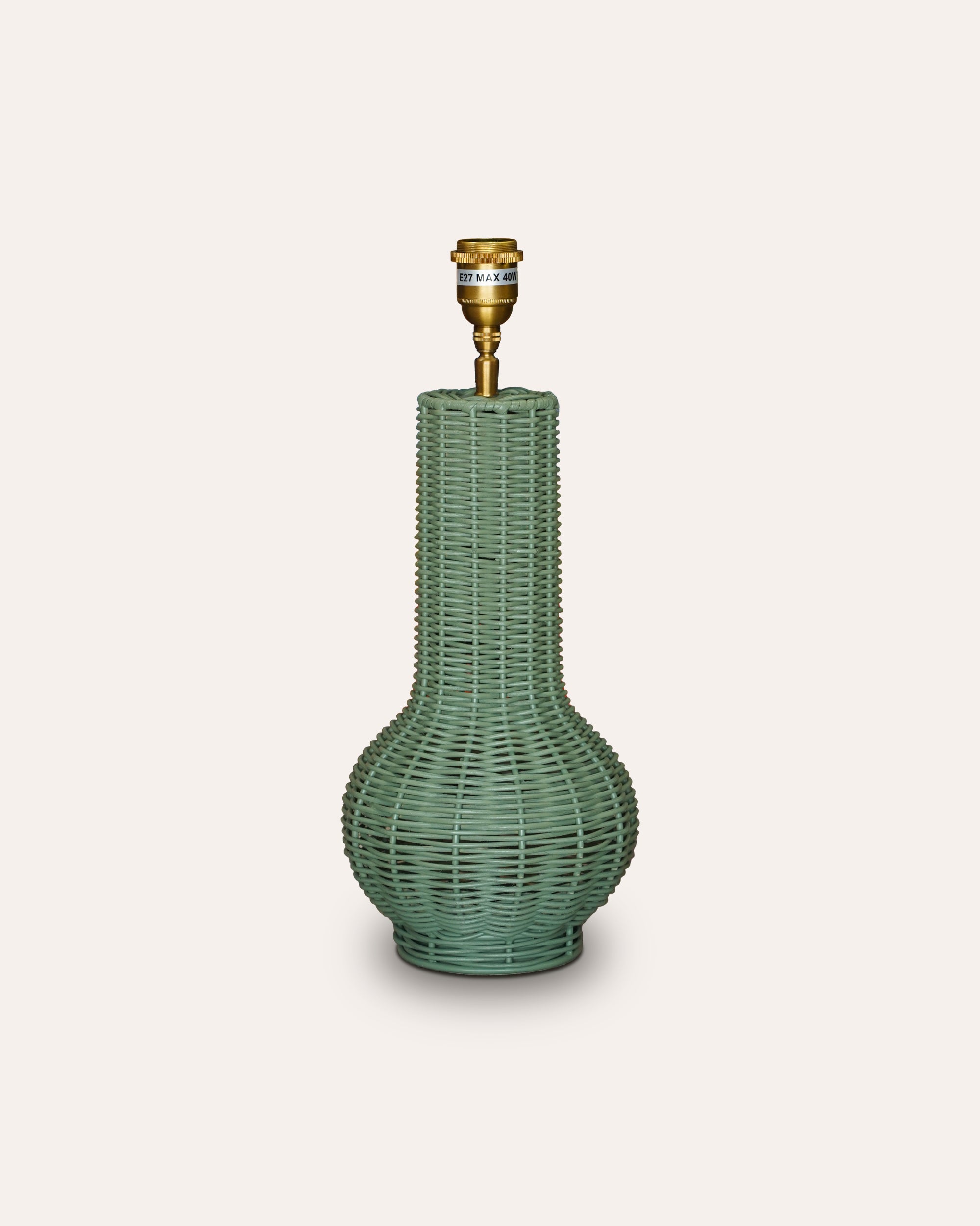 Green textured Surahi Rattan table lamp product image on a taupe background