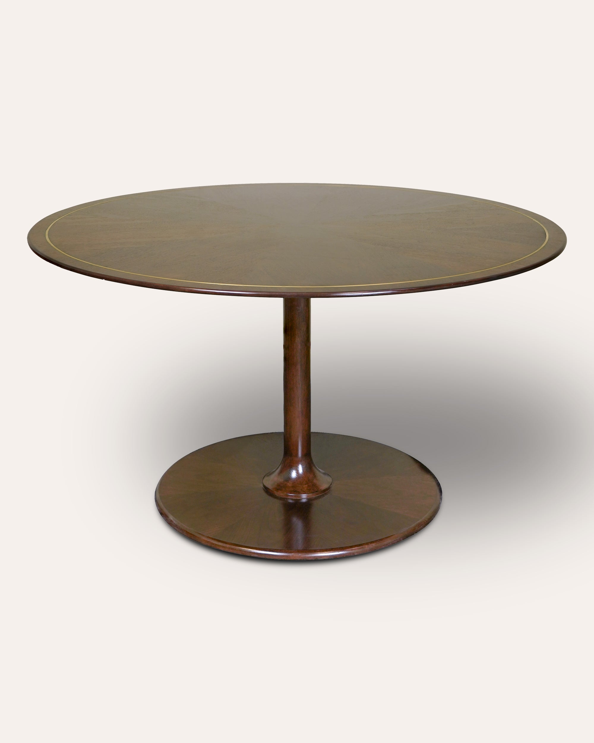A round wooden dining table with a polished pedestal base and a matching round pedestal plate, shown against a plain light background.